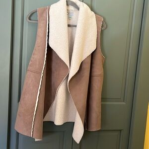 Faux suede and sherpa lined vest.